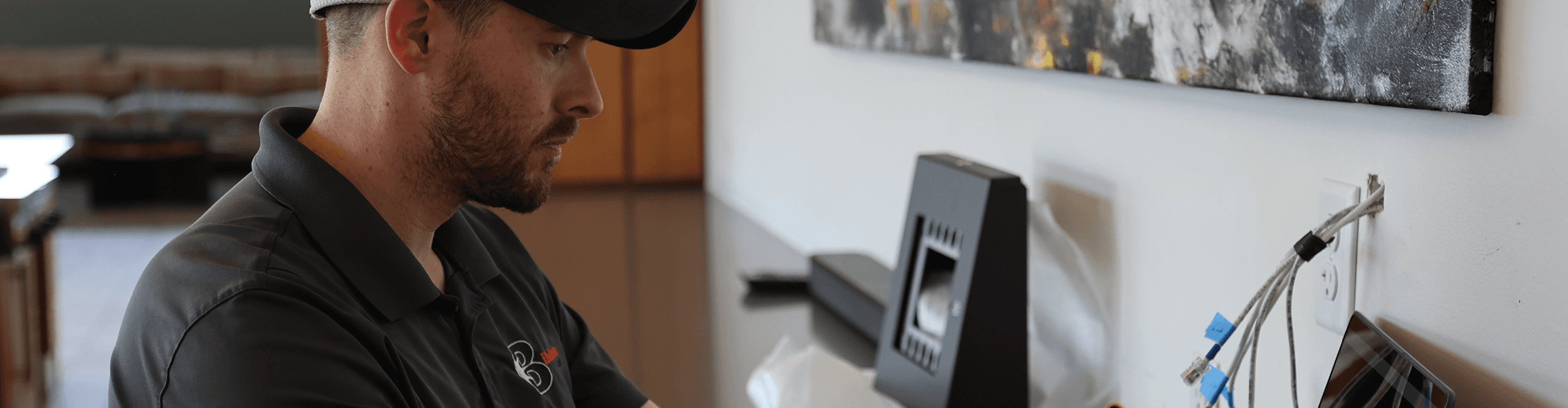 A Bibbeo technician works on installing equipment